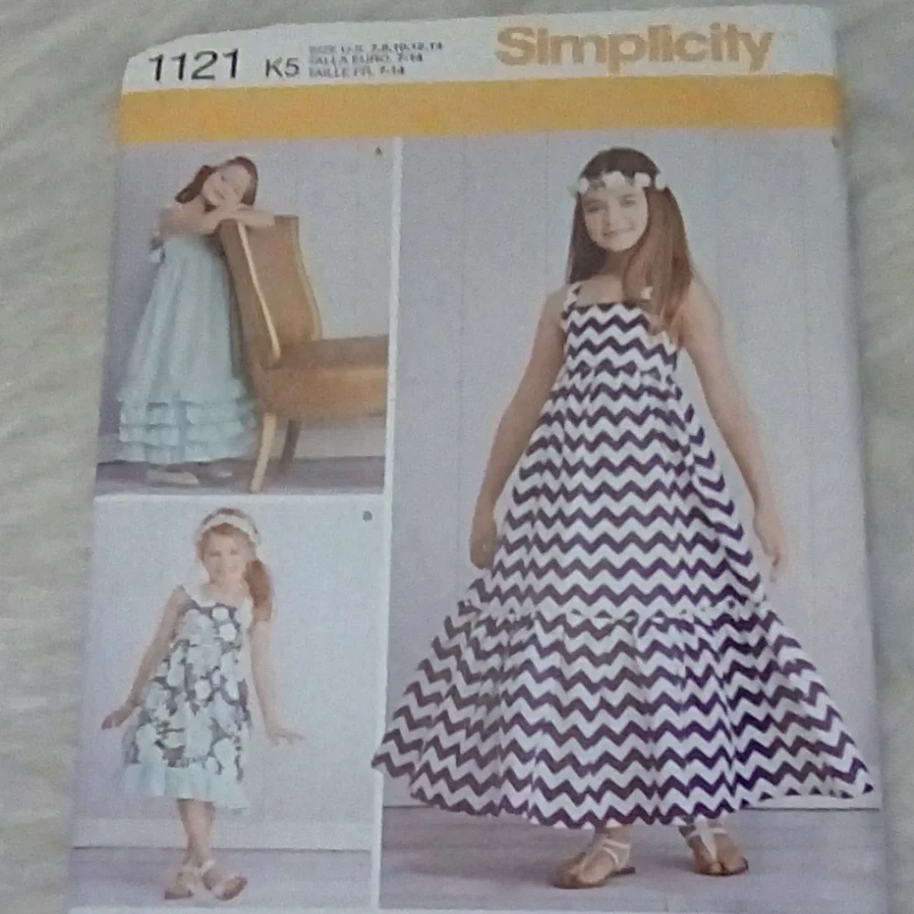 Simplicity 1121 Girls' Pull Over Dress Variations